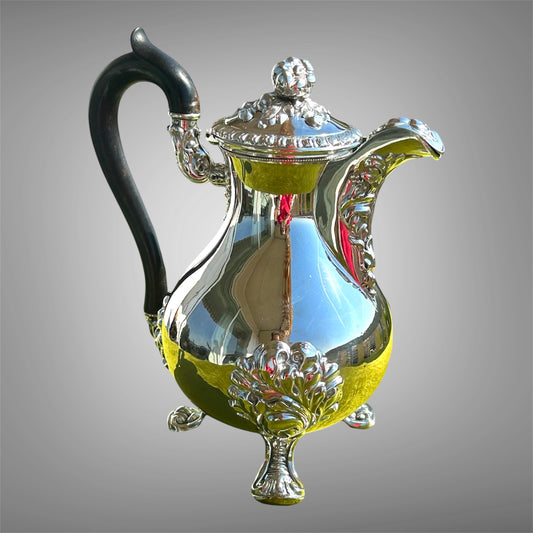 Antique silver coffee pot, ebony wood handle, France, 19th century.